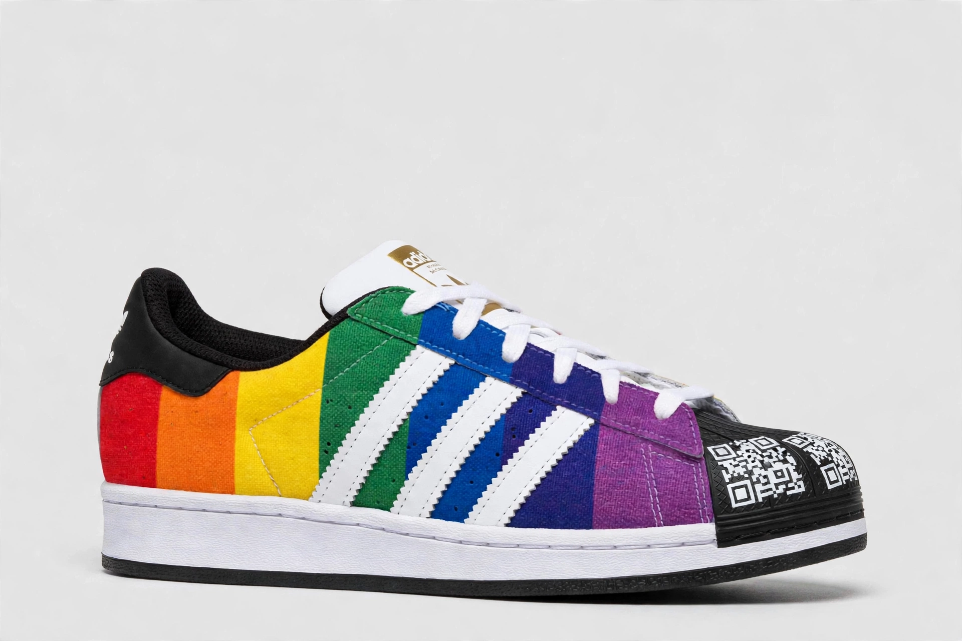 MAGA trainer concept — vertical rainbow, white stripes, black interior, black toe box with white MAGA QR code